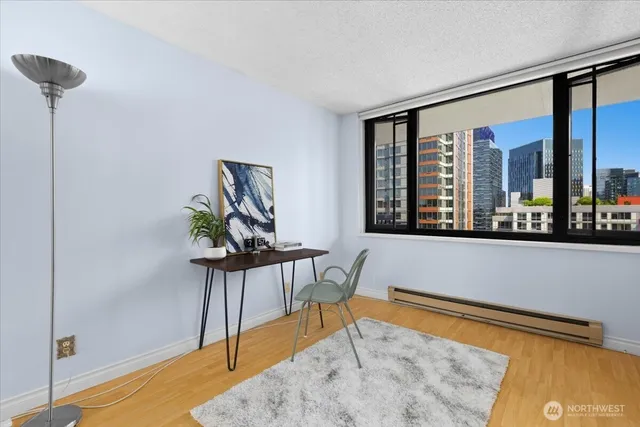 a view of an empty room with a window