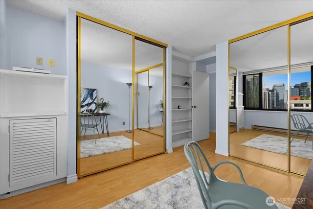 a view of a livingroom with furniture and front door