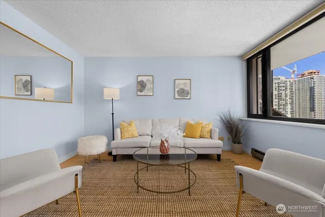 a living room with furniture and a window