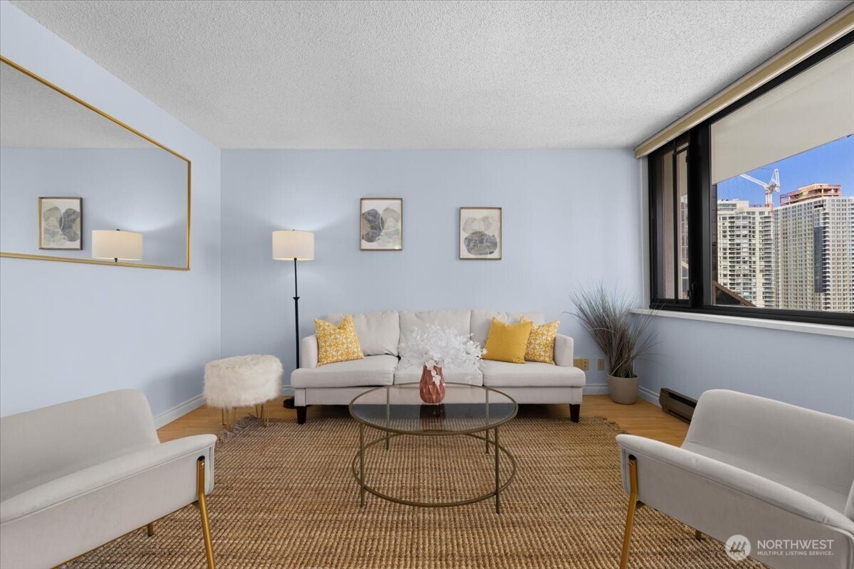 2100 3rd Avenue, Unit 2505 Seattle, WA 98121 - Photo 6 of 40 a living room with furniture and a window