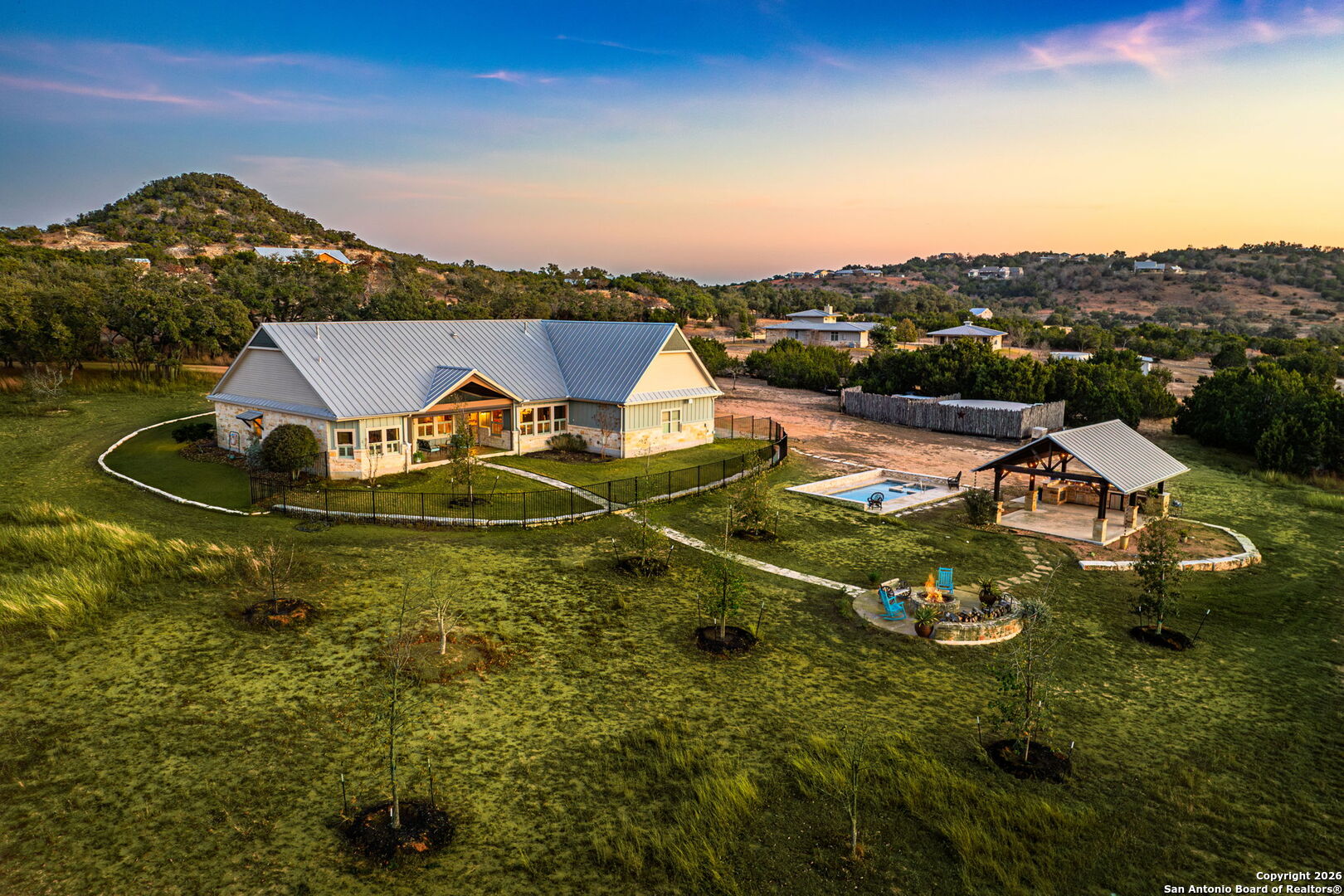 an aerial view of a house with a garden