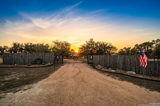 a view of a backyard of the house