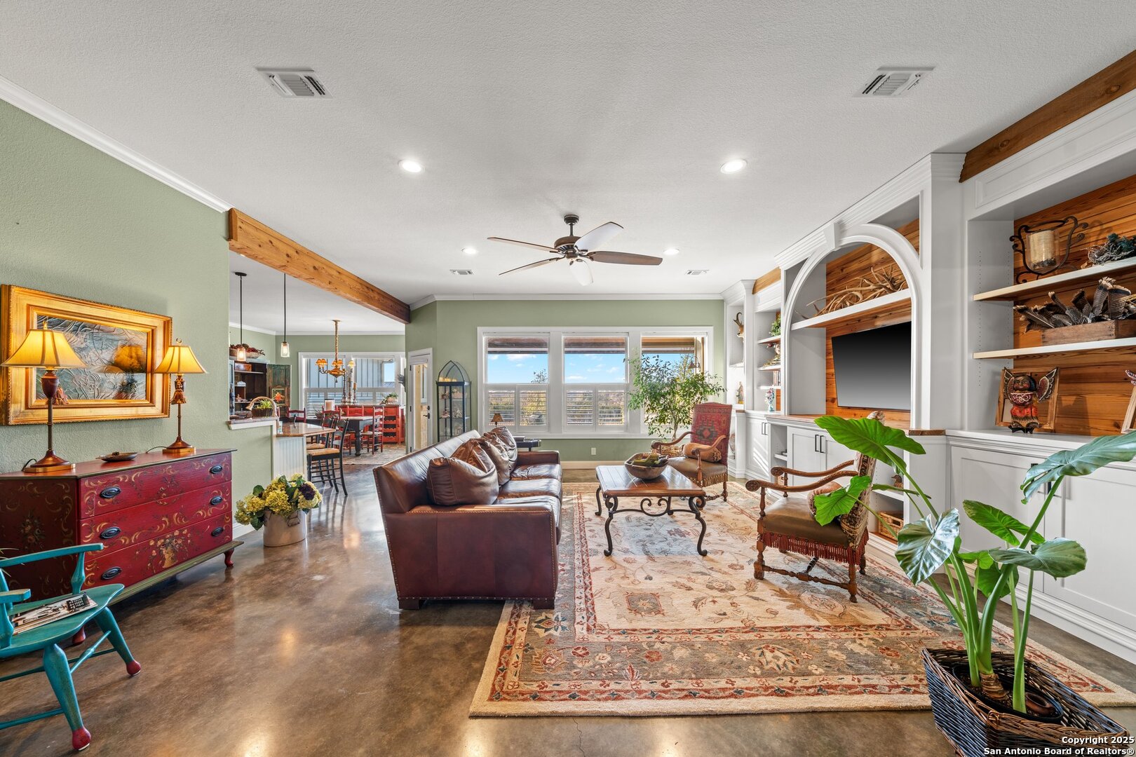 34 Rusty Spur Drive Fredericksburg, TX 78624 - Photo 18 of 49 a living room with fireplace furniture and a flat screen tv