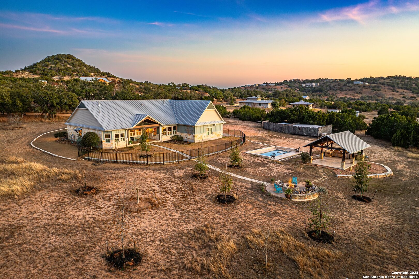 34 Rusty Spur Drive Fredericksburg, TX 78624 - Photo 2 of 49 an aerial view of a house with outdoor space