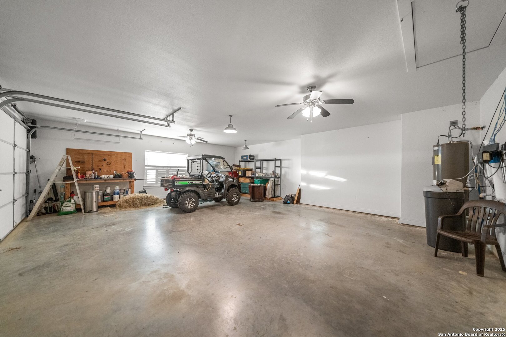 34 Rusty Spur Drive Fredericksburg, TX 78624 - Photo 35 of 49 a view of a livingroom with furniture and a ceiling fan