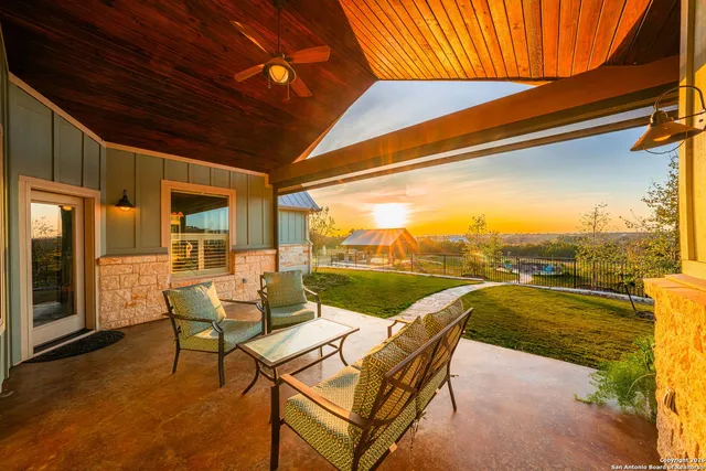 a patio with water view and a ocean view