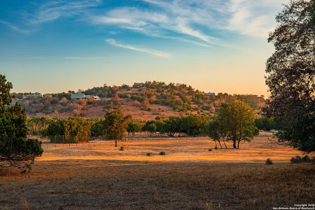 a view of swimming pool with a patio
