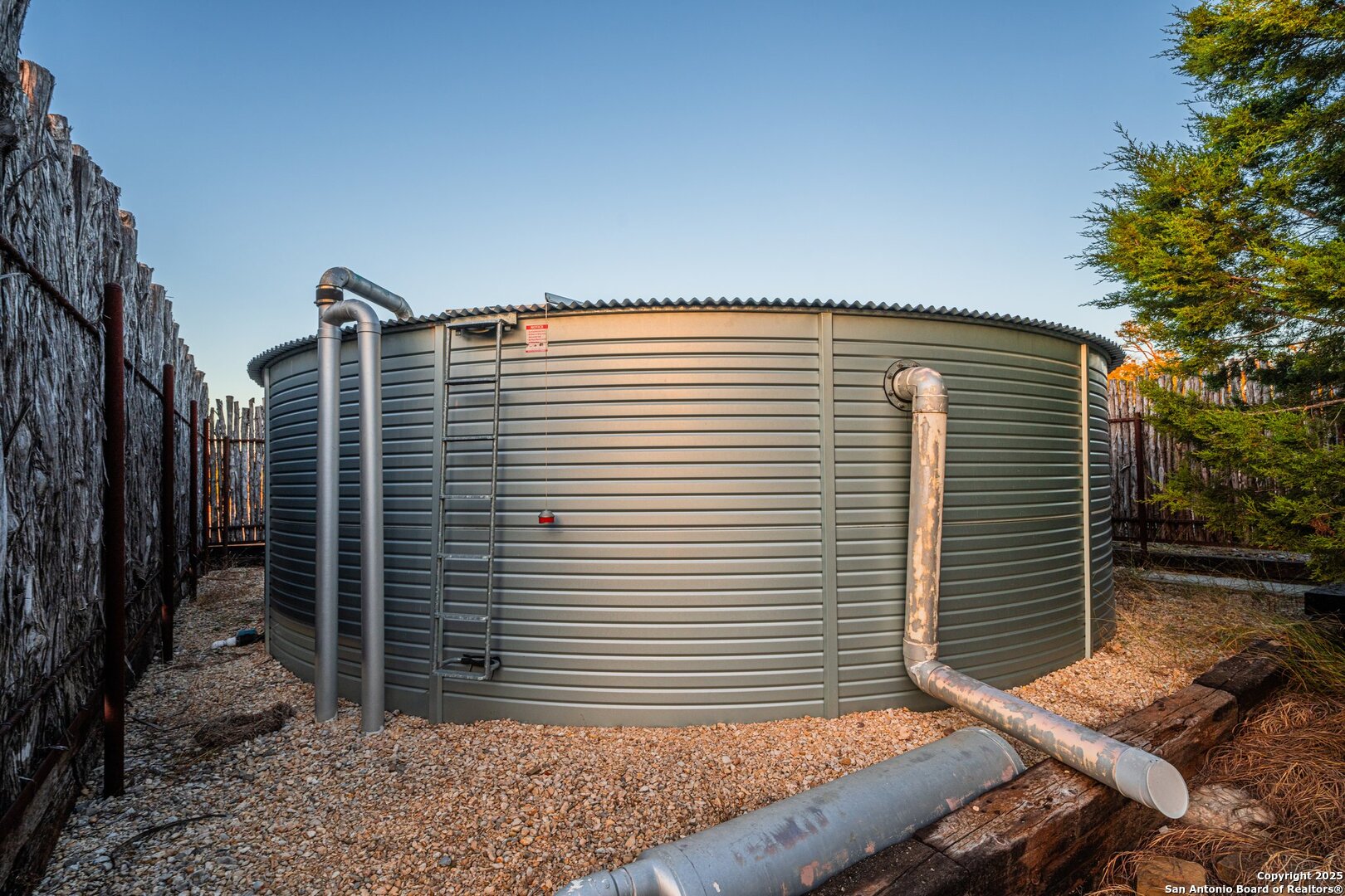 34 Rusty Spur Drive Fredericksburg, TX 78624 - Photo 47 of 49 a front view of a house with plants