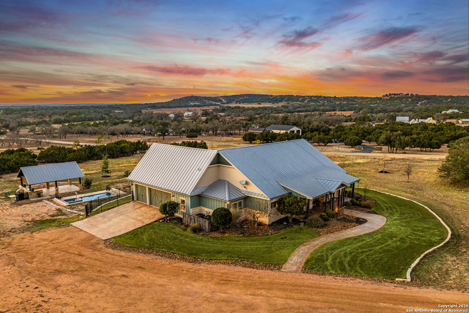 34 Rusty Spur Drive Fredericksburg, TX 78624 - Photo 8 of 49 an aerial view of a house with outdoor space and ocean view