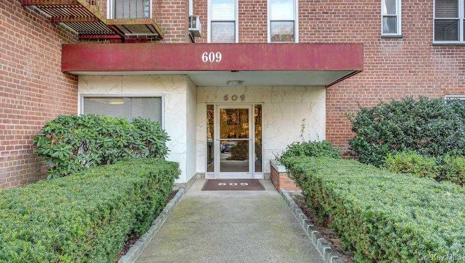 609 Palmer Road, Unit 3M Yonkers, NY 10701 - Photo 1 of 18 View of exterior entry featuring brick siding