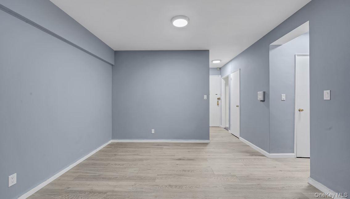 609 Palmer Road, Unit 3M Yonkers, NY 10701 - Photo 5 of 18 view of dining area, front door, entryway closet, hallway to additional closet, bathroom , and bedroom.