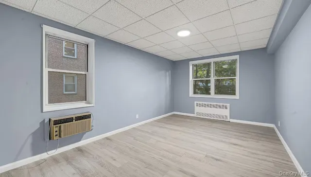 a view of an empty room with a window