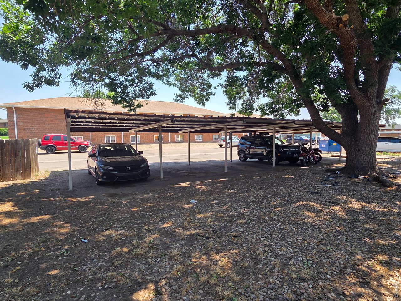 2927 State Farm Road Evans, CO 80620 - Photo 5 of 14 Carports Behind Building