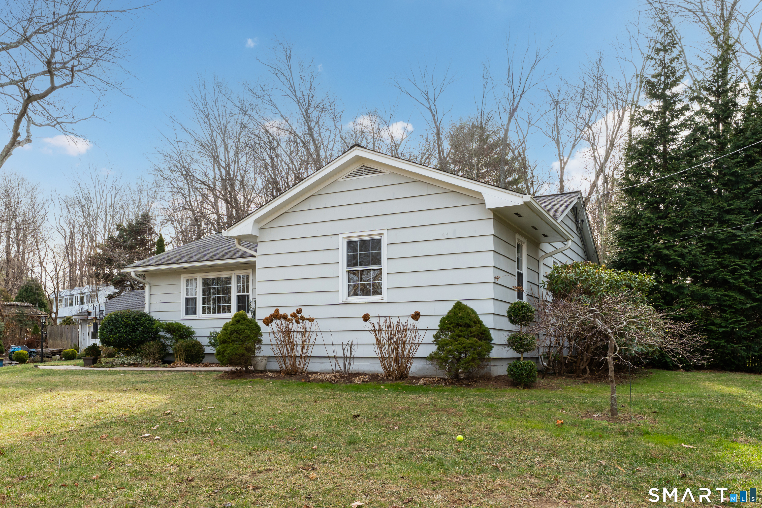 43 Fort Path Road Madison, CT 06443 - Photo 3 of 40 a view of a house with backyard