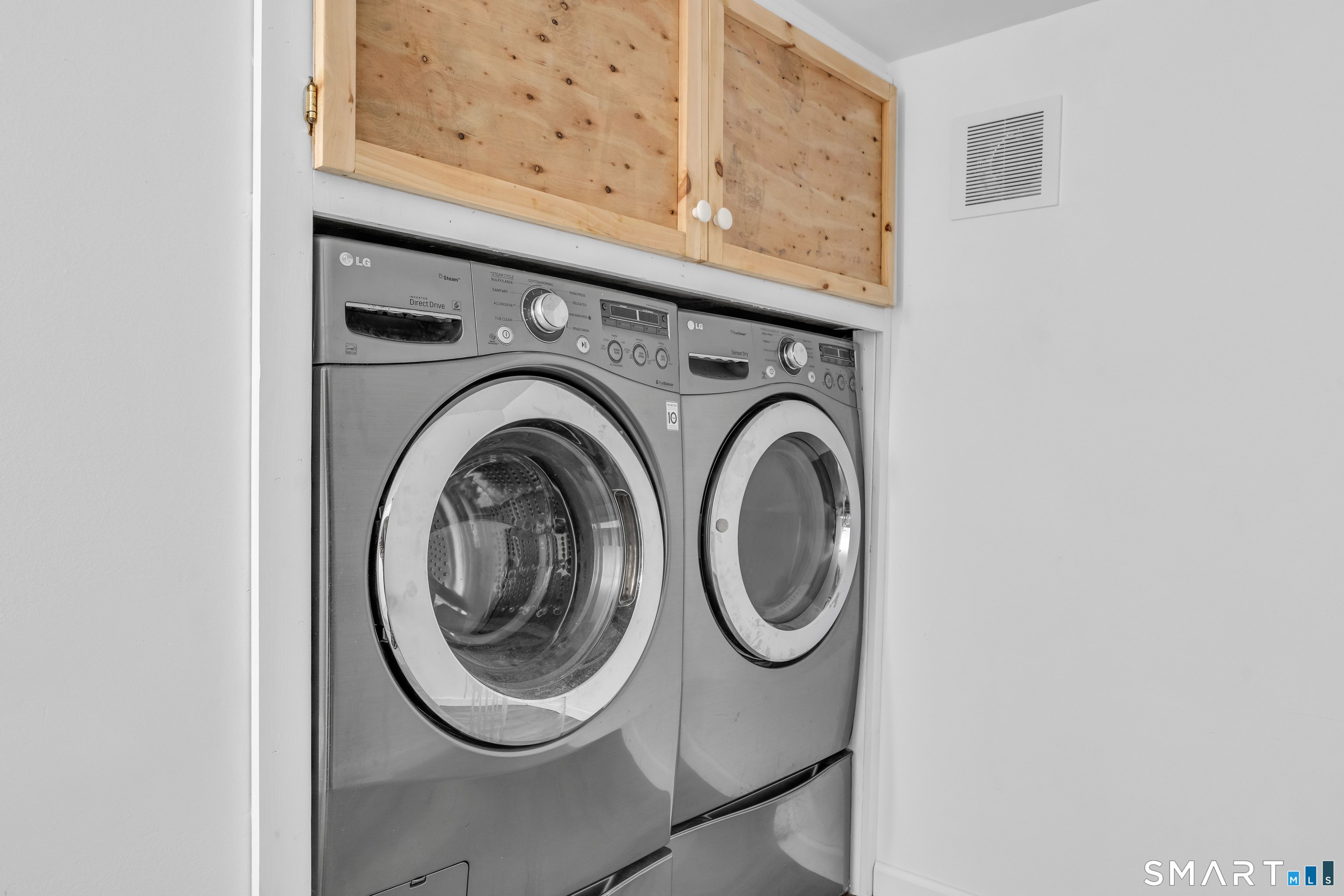 43 Fort Path Road Madison, CT 06443 - Photo 31 of 40 a utility room with dryer and washer