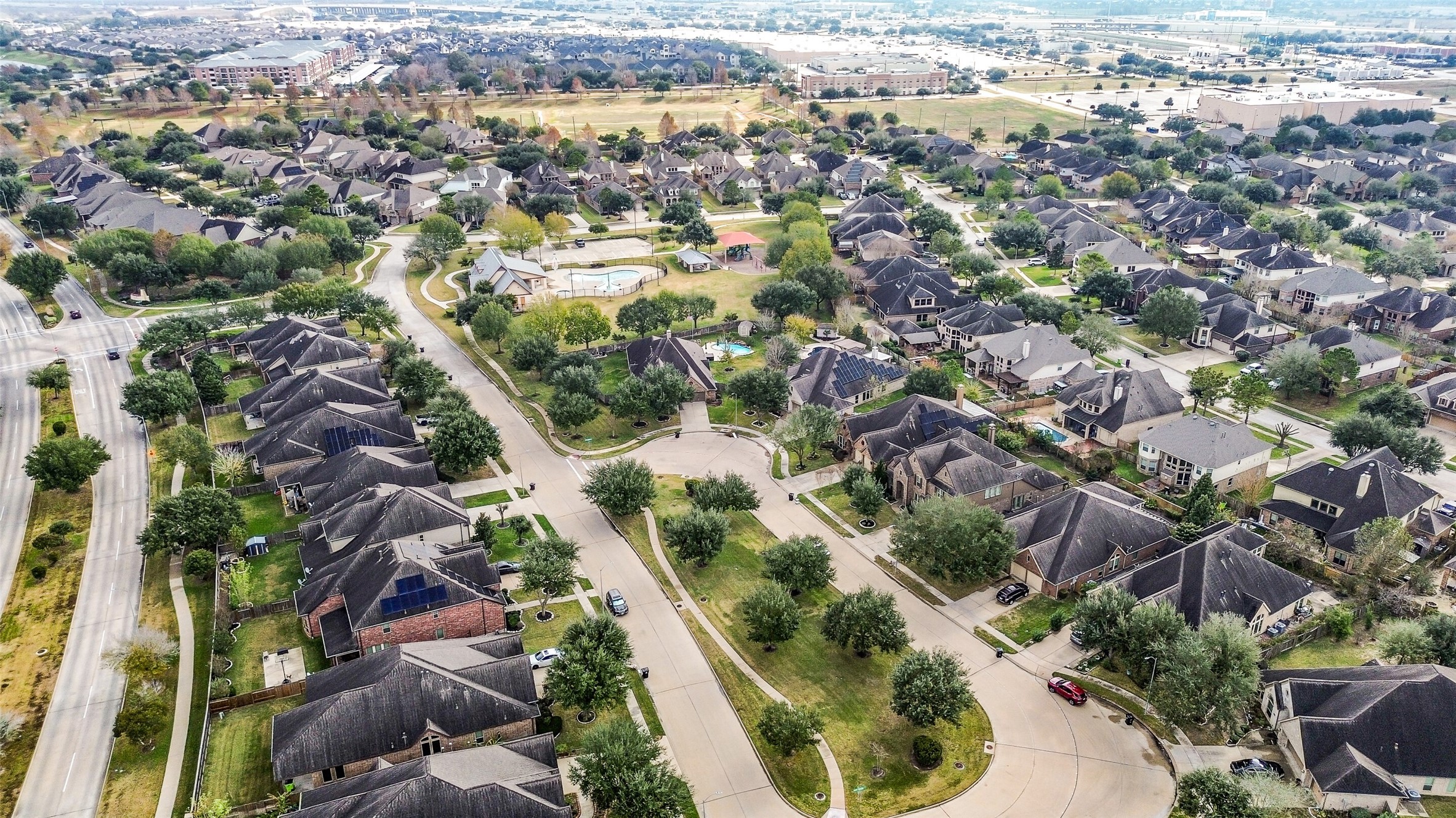 6413 Delta Crossing Court Rosenberg, TX 77471 - Photo 3 of 46 an aerial view of residential houses with outdoor space