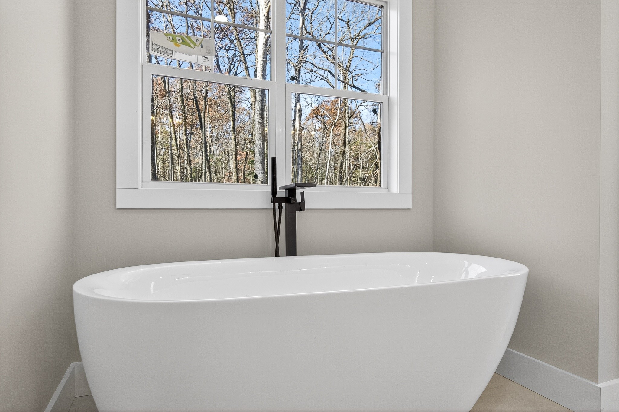 2 Browder Point Monterey, TN 38574 - Photo 28 of 51 a white bath tub sitting in a bathroom next to a window
