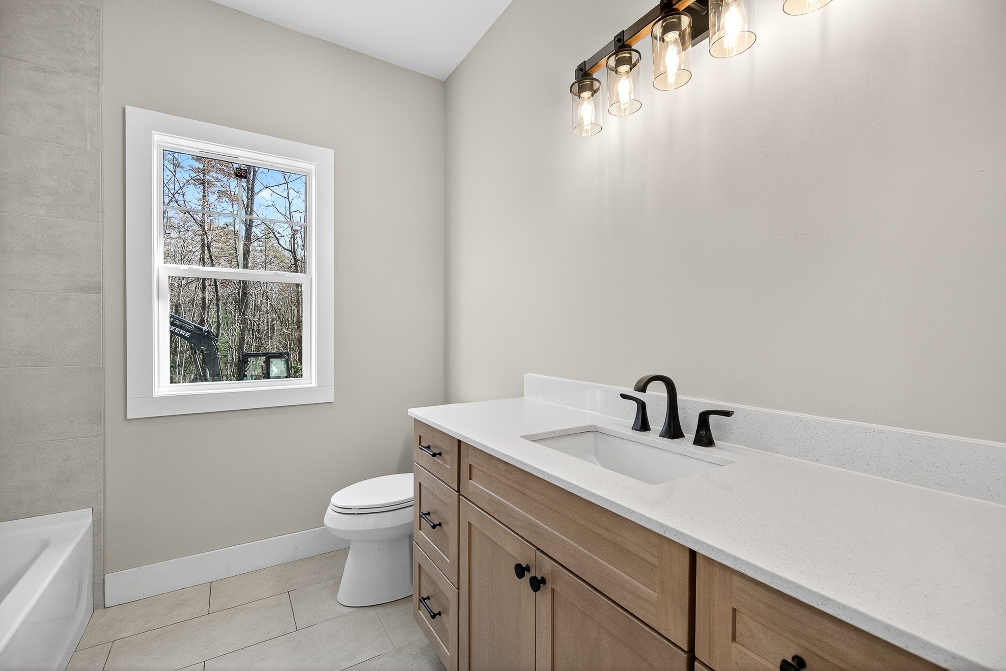 2 Browder Point Monterey, TN 38574 - Photo 37 of 51 a bathroom with a toilet a sink a window and mirror