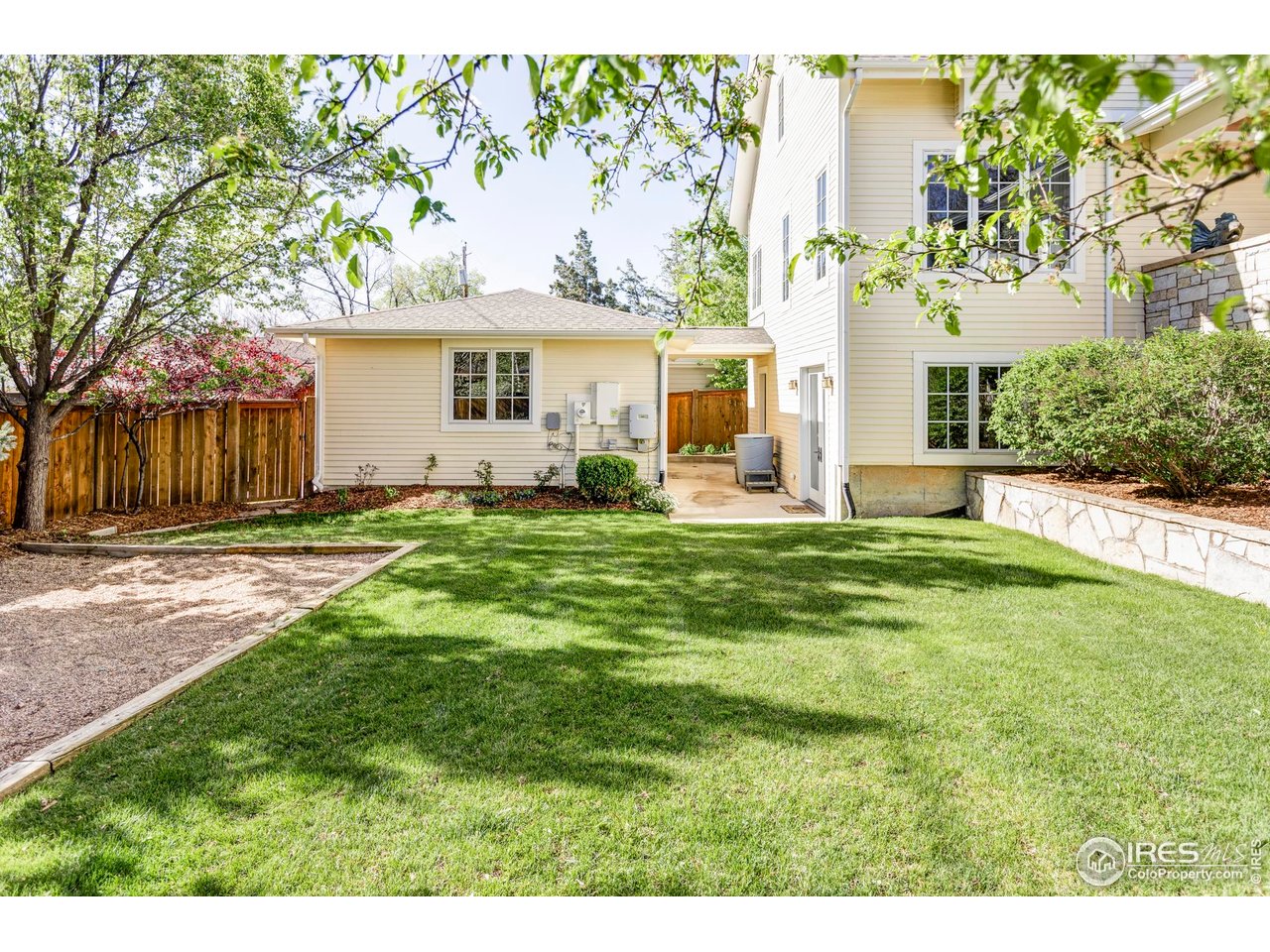 3132 5th Street Boulder, CO 80304 - Photo 21 of 27 a view of a house with a yard