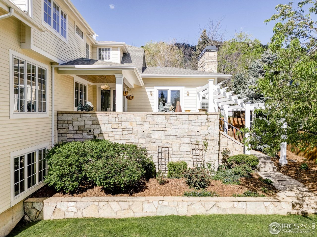 3132 5th Street Boulder, CO 80304 - Photo 23 of 27 a front view of a house with a yard