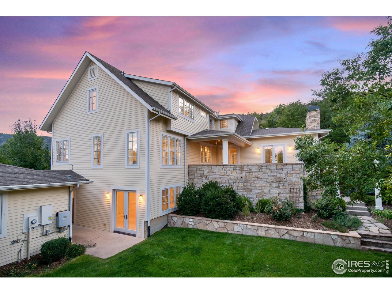 3132 5th Street Boulder, CO 80304 - Photo 24 of 27 a front view of a house with a yard