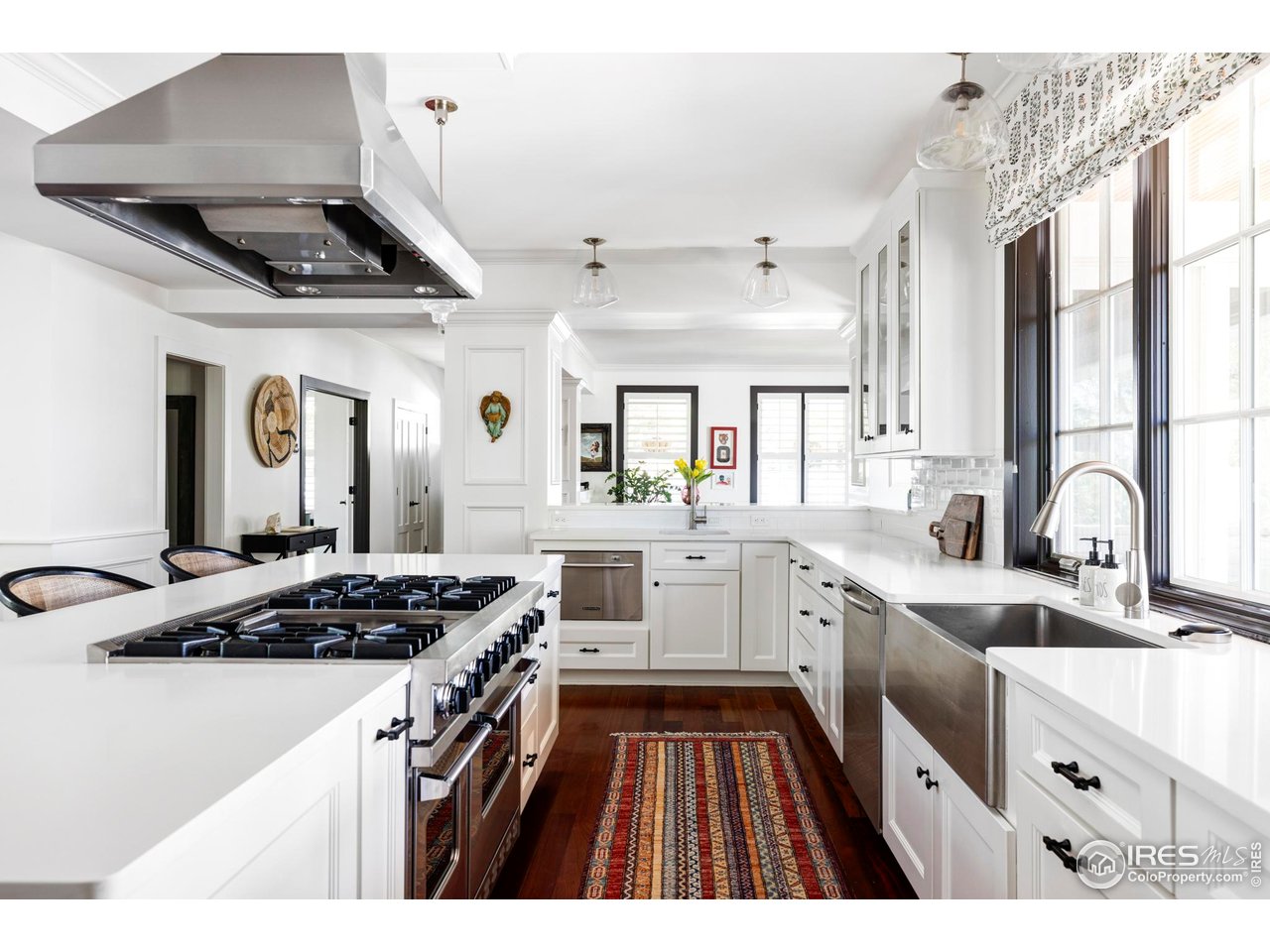 3132 5th Street Boulder, CO 80304 - Photo 4 of 27 a kitchen that has a sink and a stove