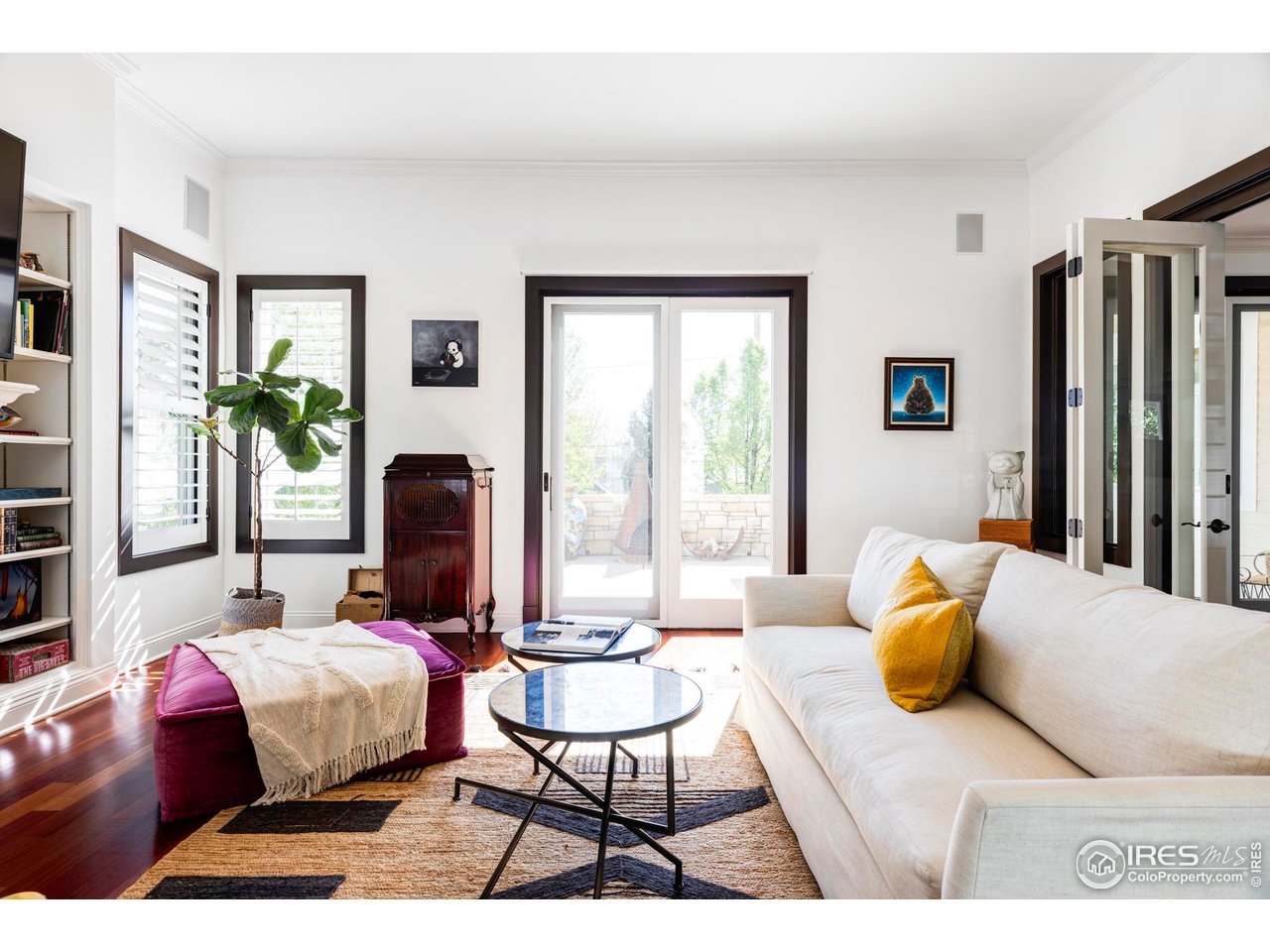 3132 5th Street Boulder, CO 80304 - Photo 8 of 27 a bedroom with a bed and a couch