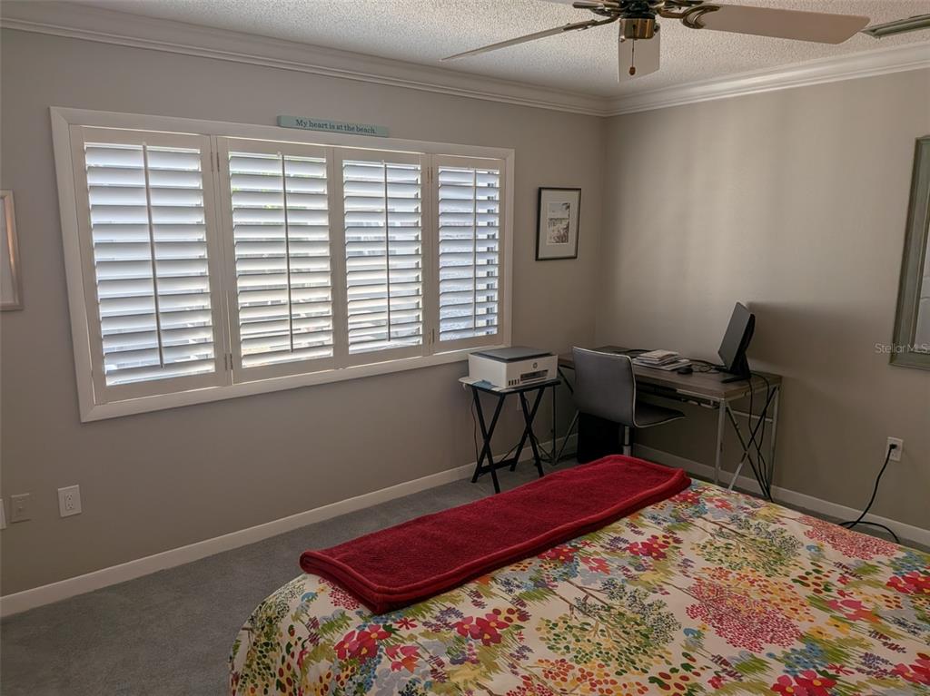 700 Starkey Road, Unit 821 Largo, FL 33771 - Photo 15 of 29 a view of a workspace with furniture and a window