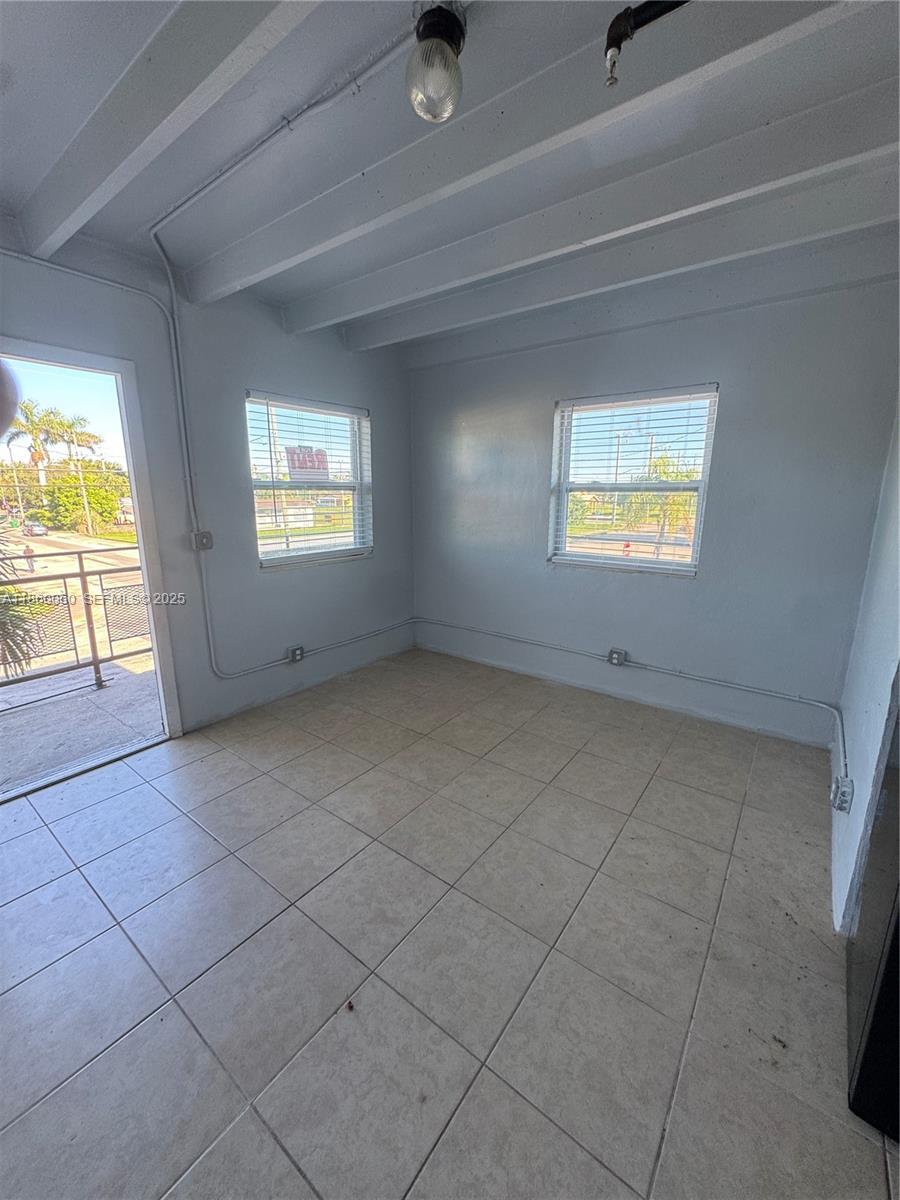 an empty room with windows