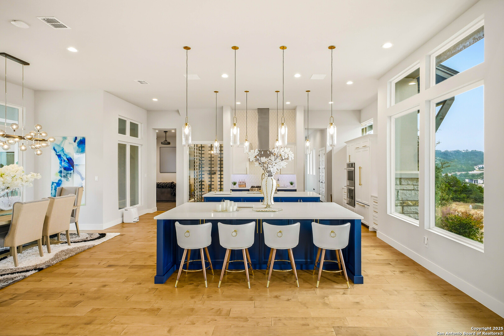 23315 Ebner Ridge San Antonio, TX 78255 - Photo 27 of 103 a view of a dining room with furniture window and wooden floor