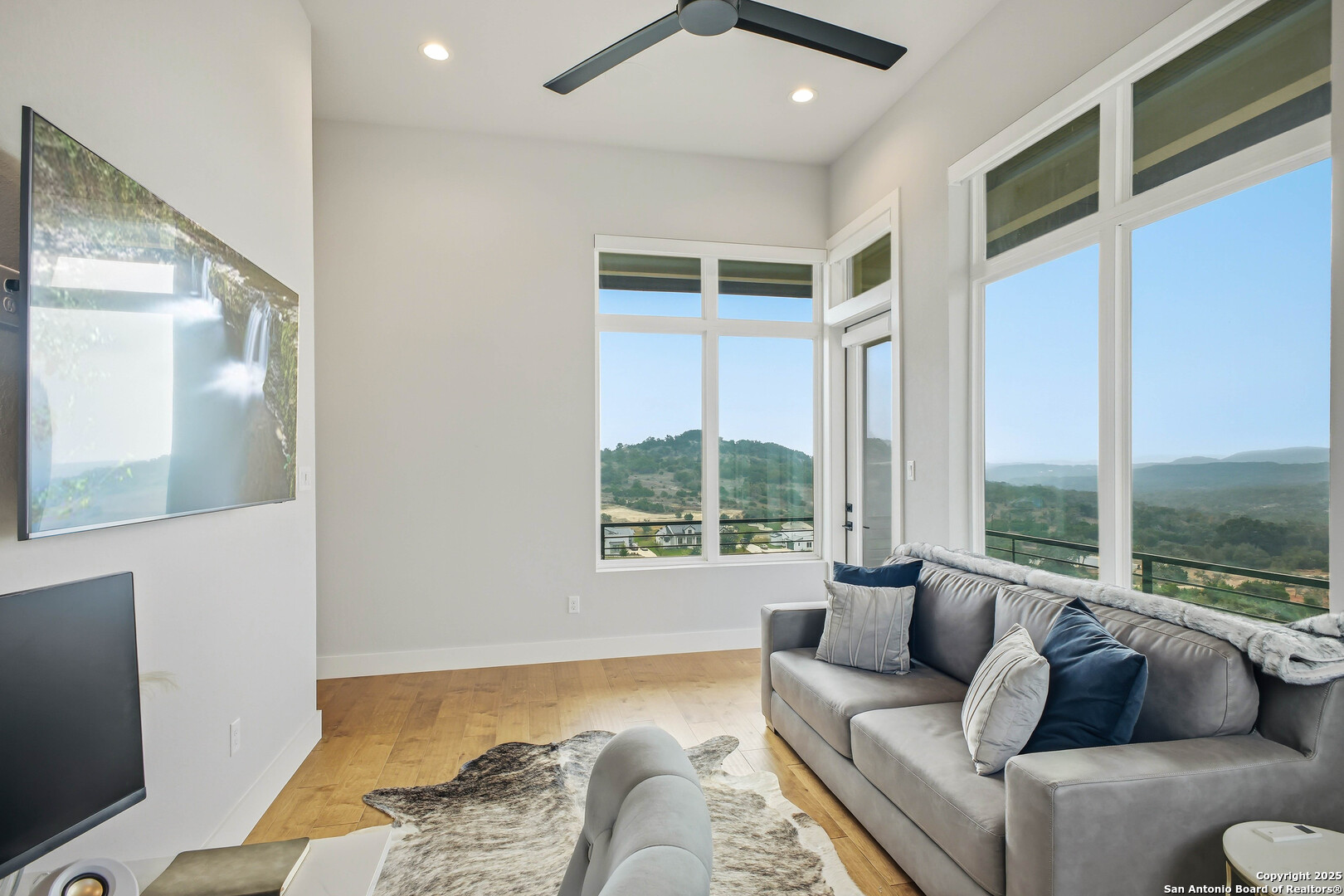 23315 Ebner Ridge San Antonio, TX 78255 - Photo 57 of 103 a living room with furniture and a large window