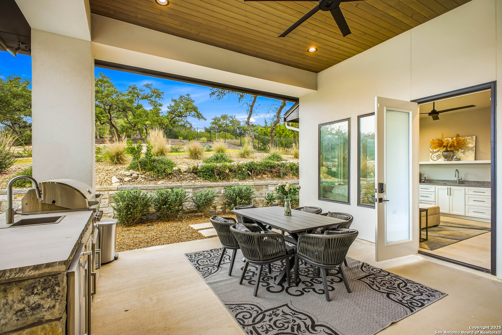 23315 Ebner Ridge San Antonio, TX 78255 - Photo 69 of 103 a view of a dining room with furniture window and outside view
