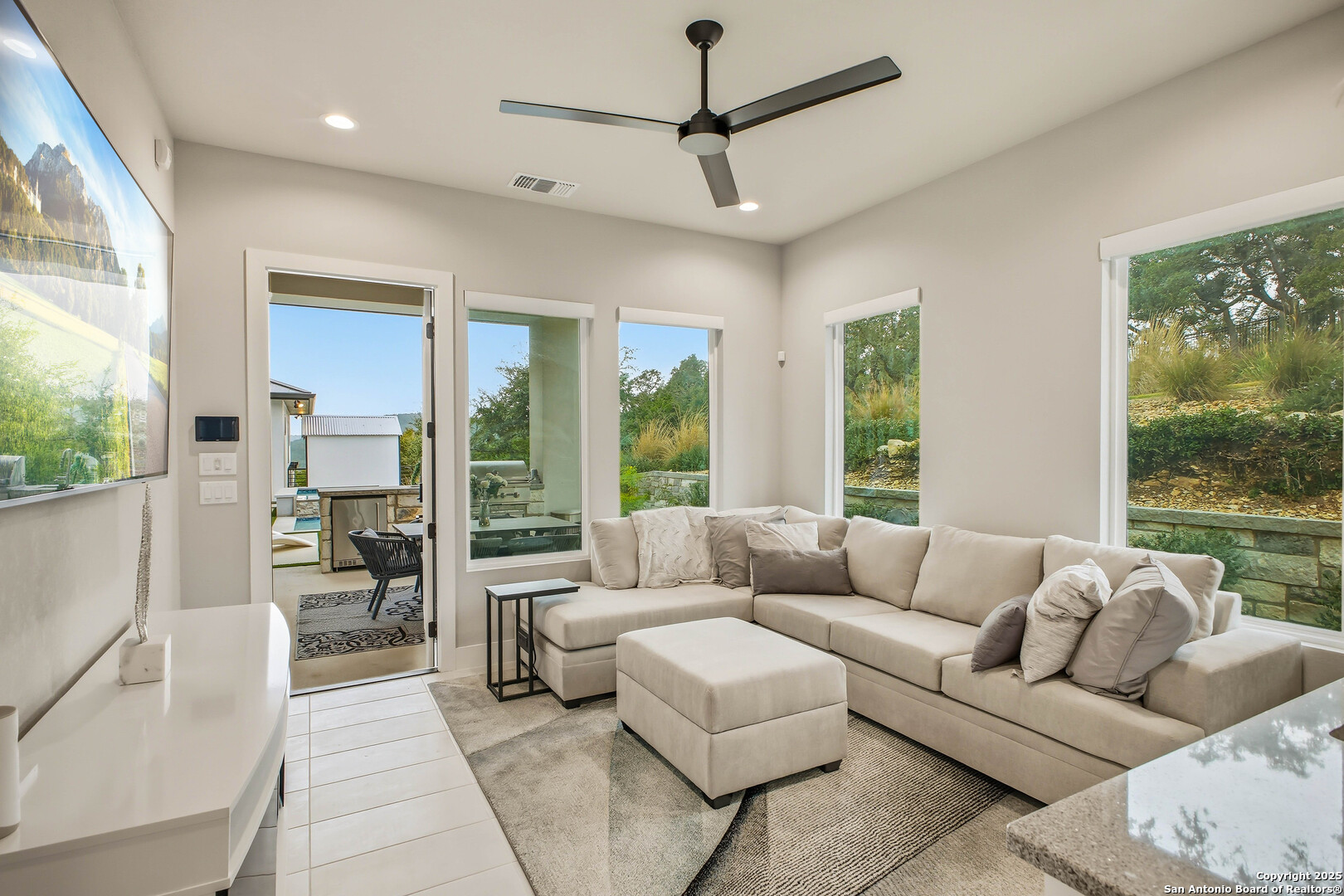 23315 Ebner Ridge San Antonio, TX 78255 - Photo 71 of 103 a living room with furniture and a large window