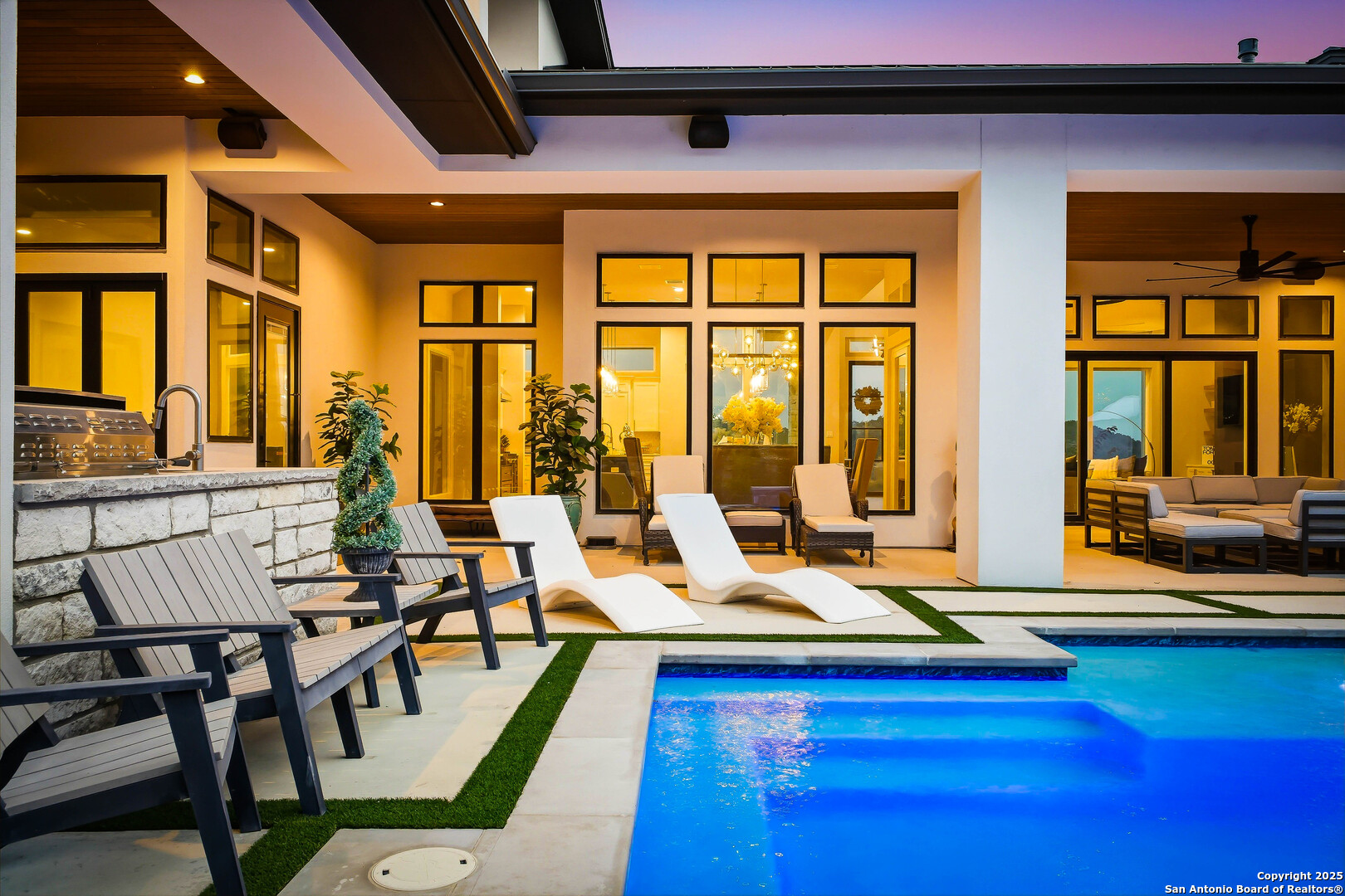 23315 Ebner Ridge San Antonio, TX 78255 - Photo 79 of 103 a living room with furniture and floor to ceiling windows