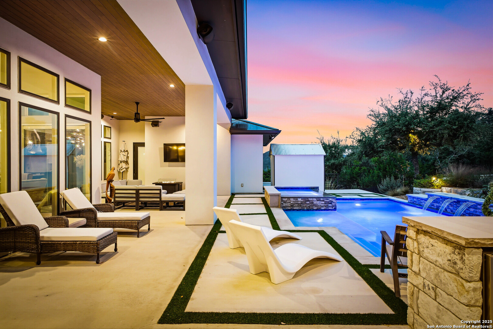 23315 Ebner Ridge San Antonio, TX 78255 - Photo 82 of 103 a swimming pool with outdoor seating and yard in the back