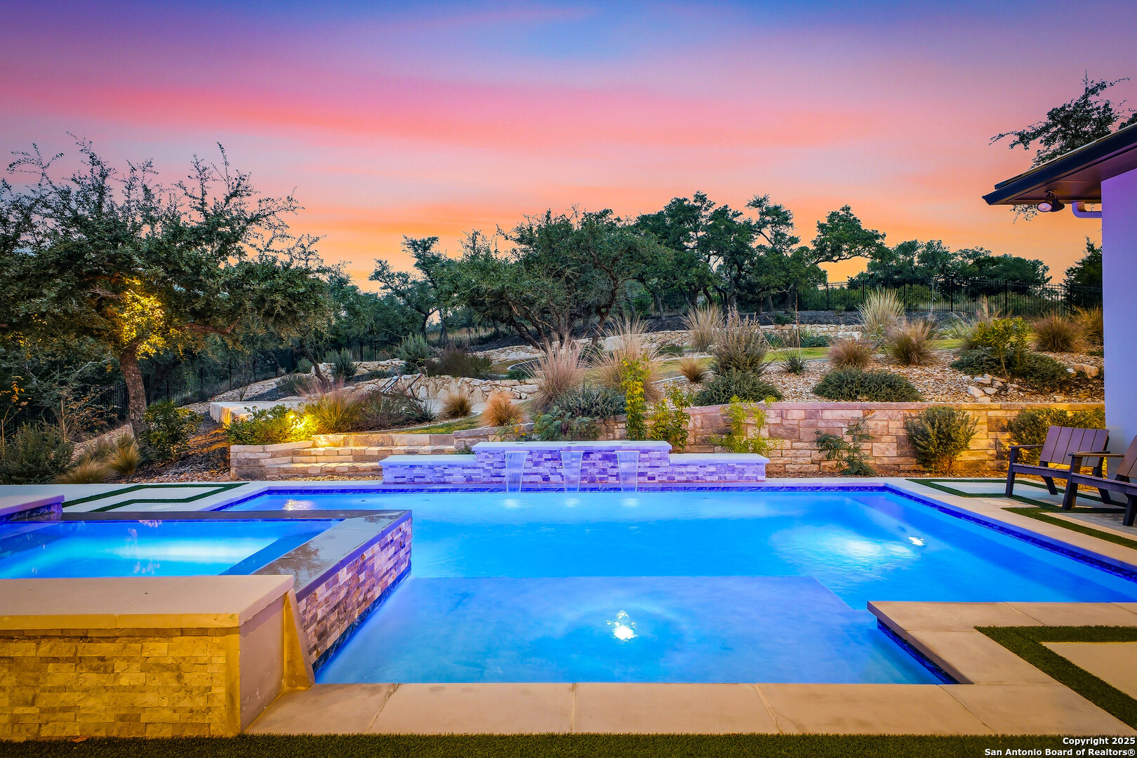 23315 Ebner Ridge San Antonio, TX 78255 - Photo 85 of 103 a view of a swimming pool with an outdoor space and seating area