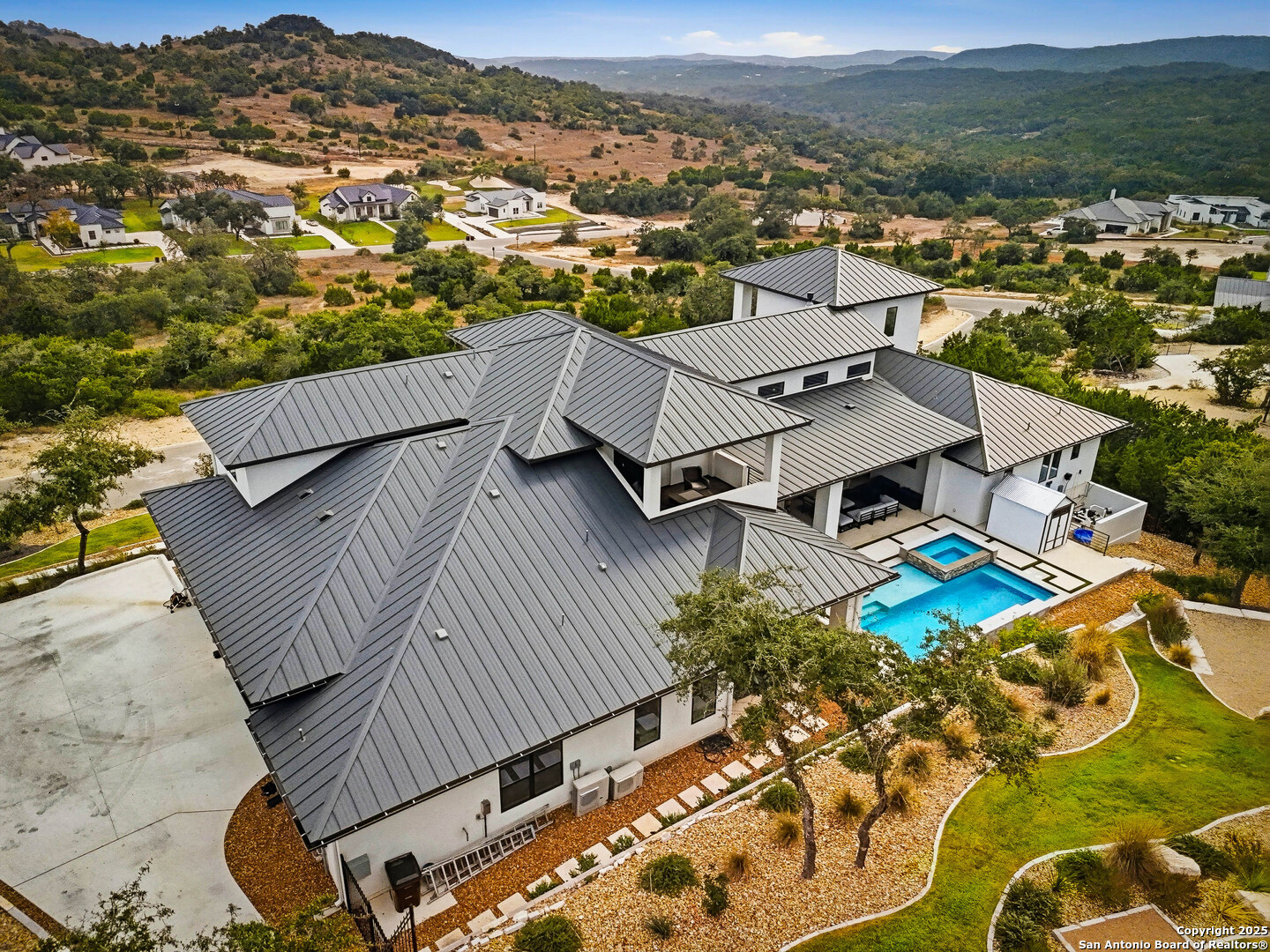 23315 Ebner Ridge San Antonio, TX 78255 - Photo 99 of 103 an aerial view of residential houses with outdoor space