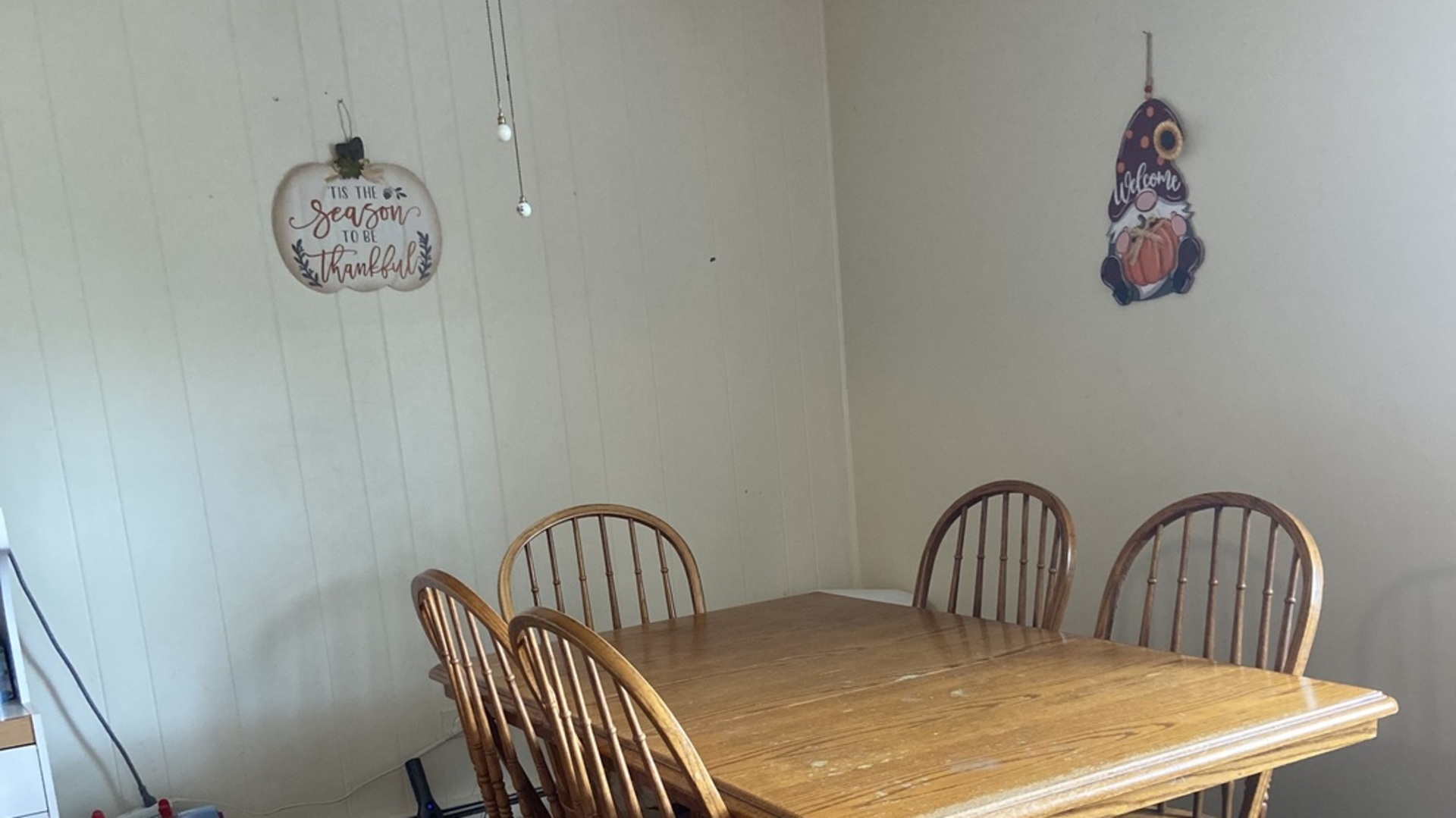 889 Trace Drive, Unit 210 Buffalo Grove, IL 60089 - Photo 3 of 9 a bathroom with a table chairs and a window