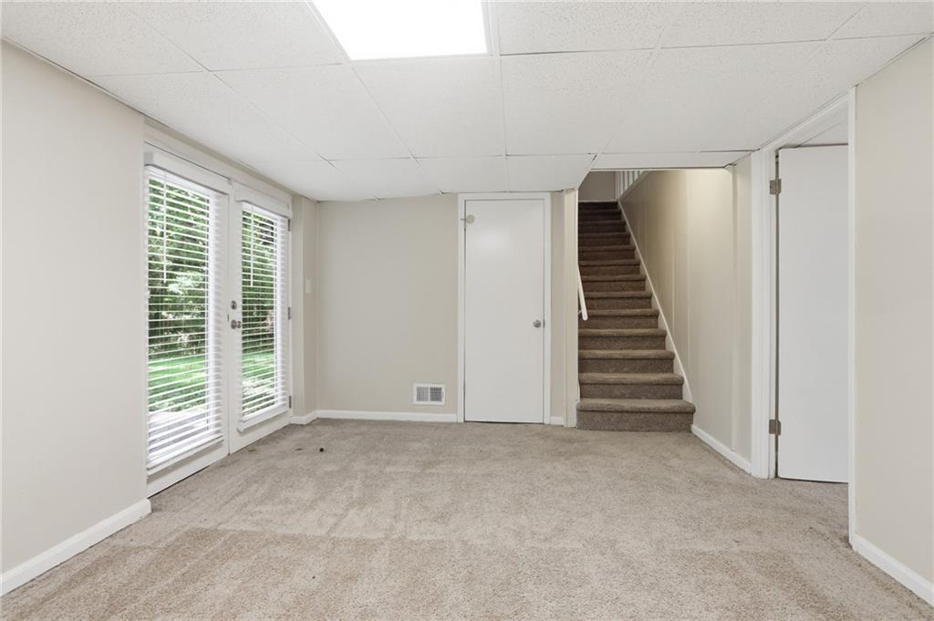 4505 Wonder Valley Trail Decatur, GA 30034 - Photo 20 of 34 a view of an empty room with stairs