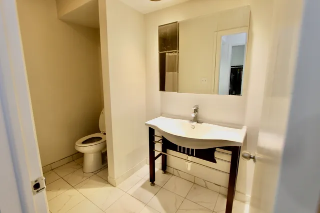 a bathroom with a sink and a toilet