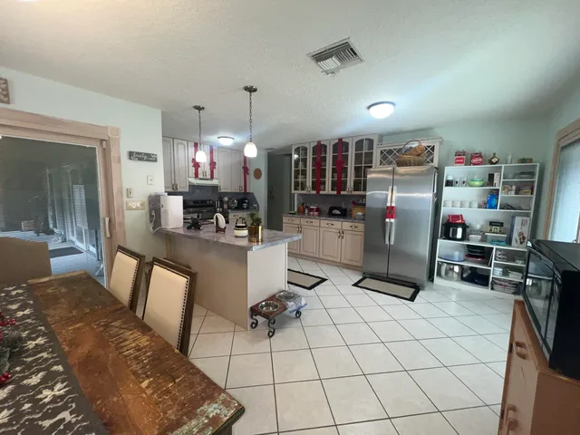 $625,000 | 10340 Southeast Jupiter Narrows Drive, Hobe Sound, FL 33455