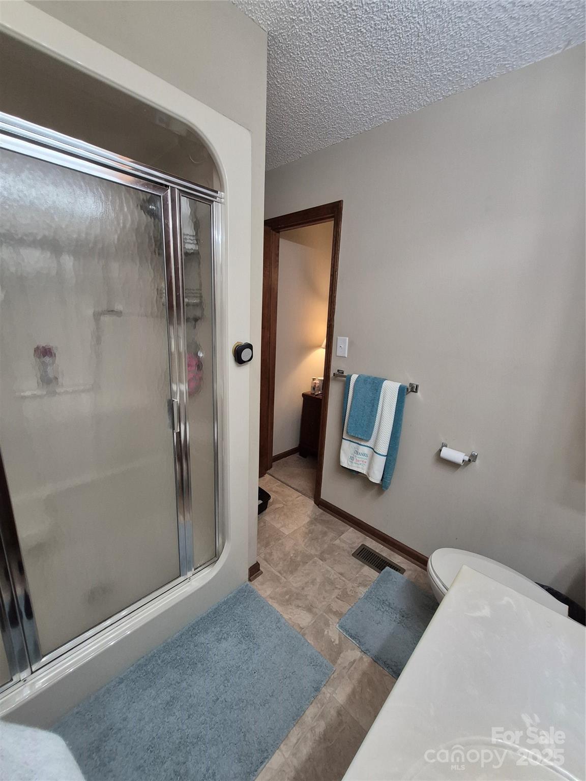 1349 High Shoals Road Lincolnton, NC 28092 - Photo 20 of 42 a living room with a couch