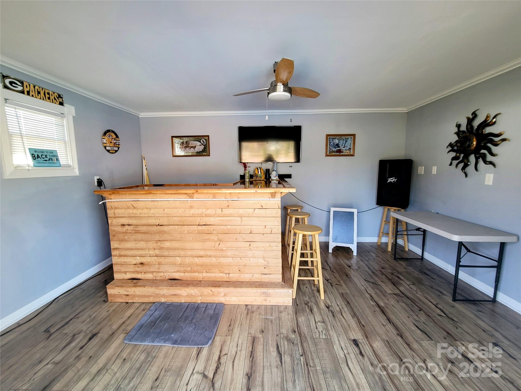 1349 High Shoals Road Lincolnton, NC 28092 - Photo 34 of 42 a bedroom with a bed and wooden floor