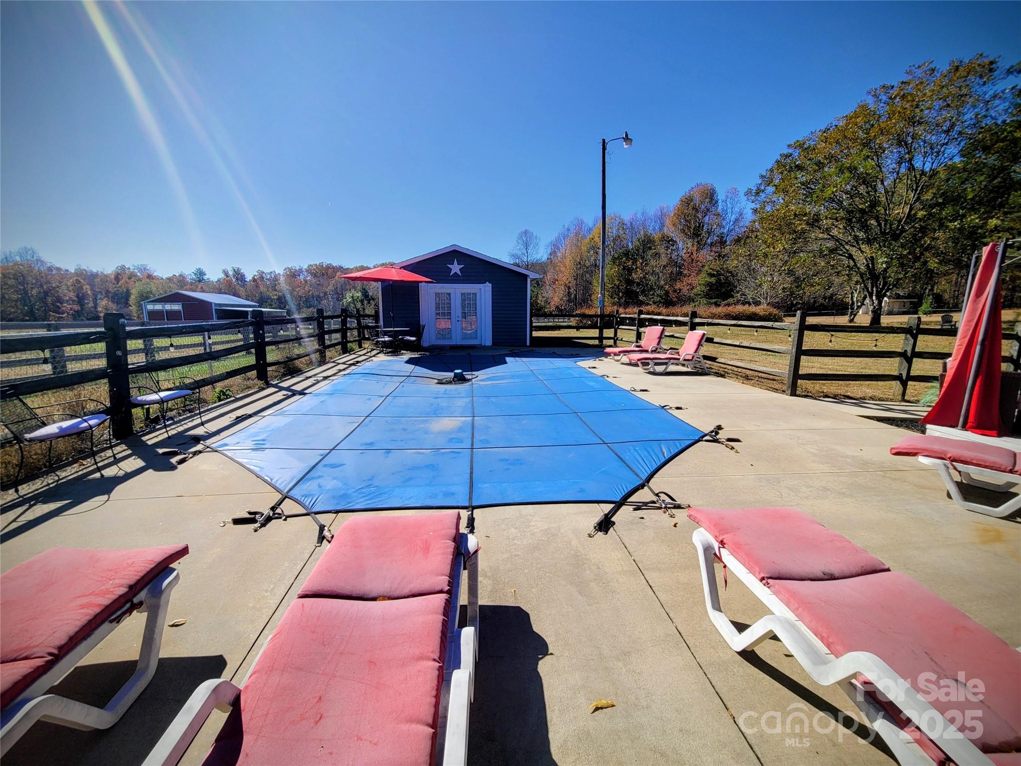 1349 High Shoals Road Lincolnton, NC 28092 - Photo 36 of 42 a view of a balcony with chairs
