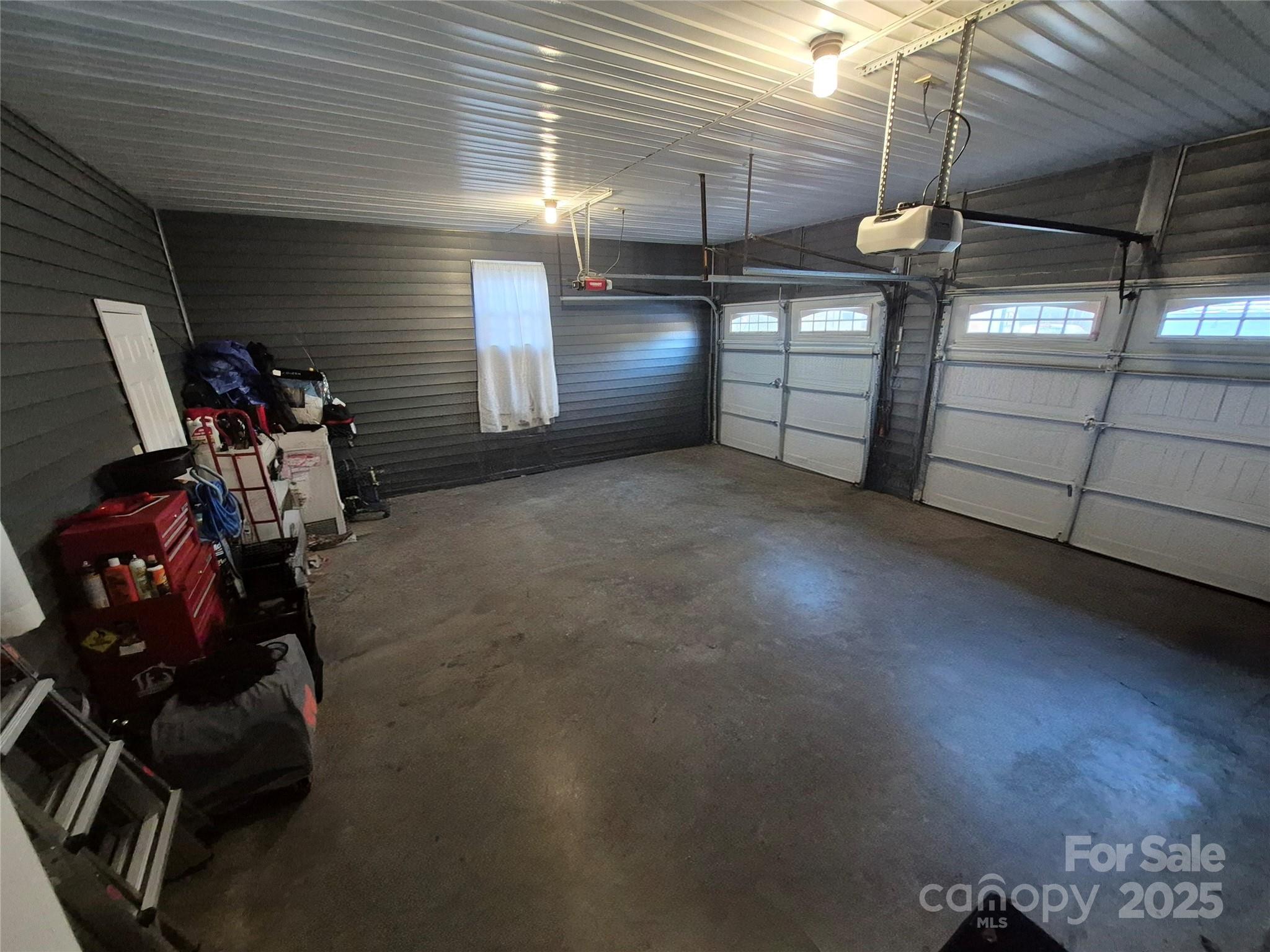 1349 High Shoals Road Lincolnton, NC 28092 - Photo 38 of 42 a view of a garage with storage