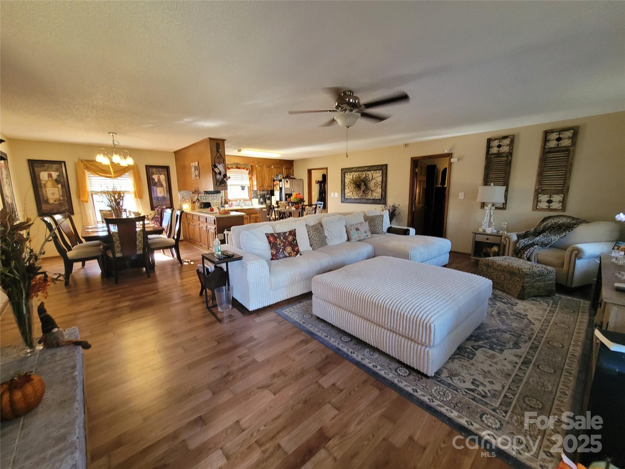 1349 High Shoals Road Lincolnton, NC 28092 - Photo 5 of 42 a bedroom with furniture and wooden floor
