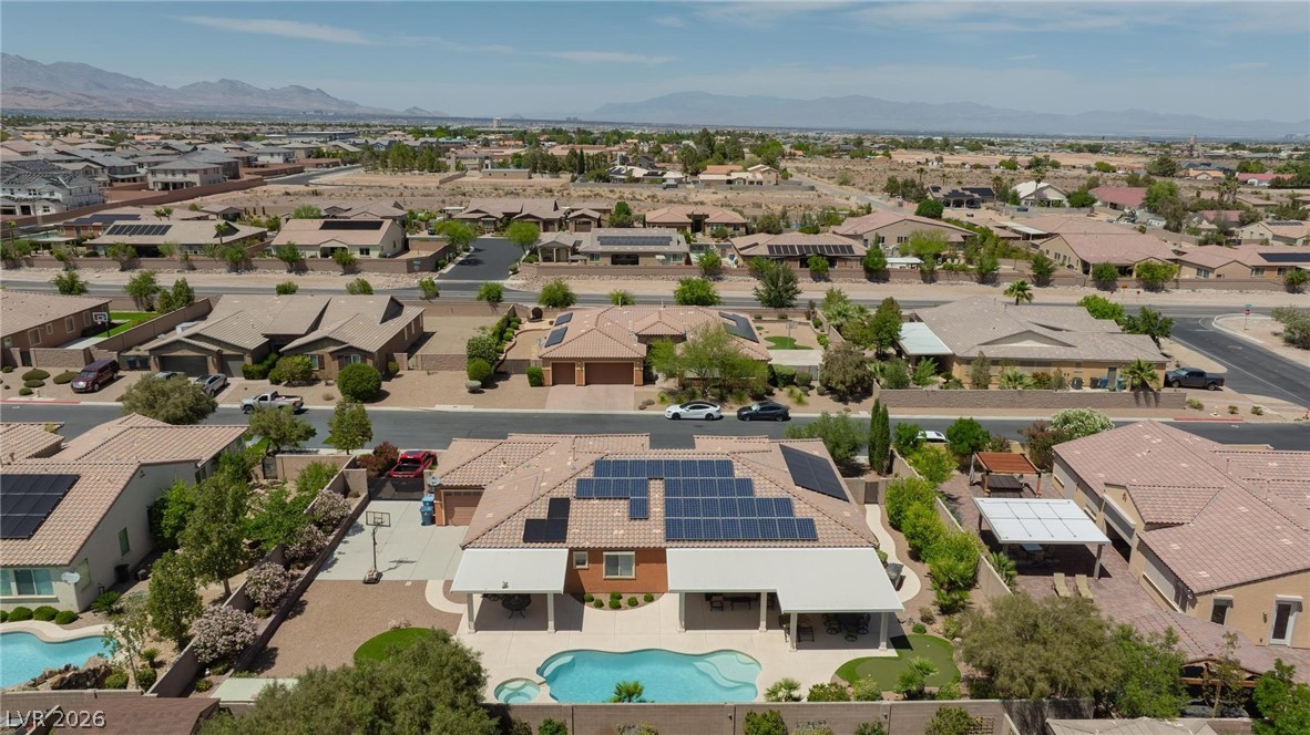 8431 Durango Ranch Court Las Vegas, NV 89113 - Photo 48 of 49 An aerial view showcases this desert oasis with an inviting pool, ideal for warm days.