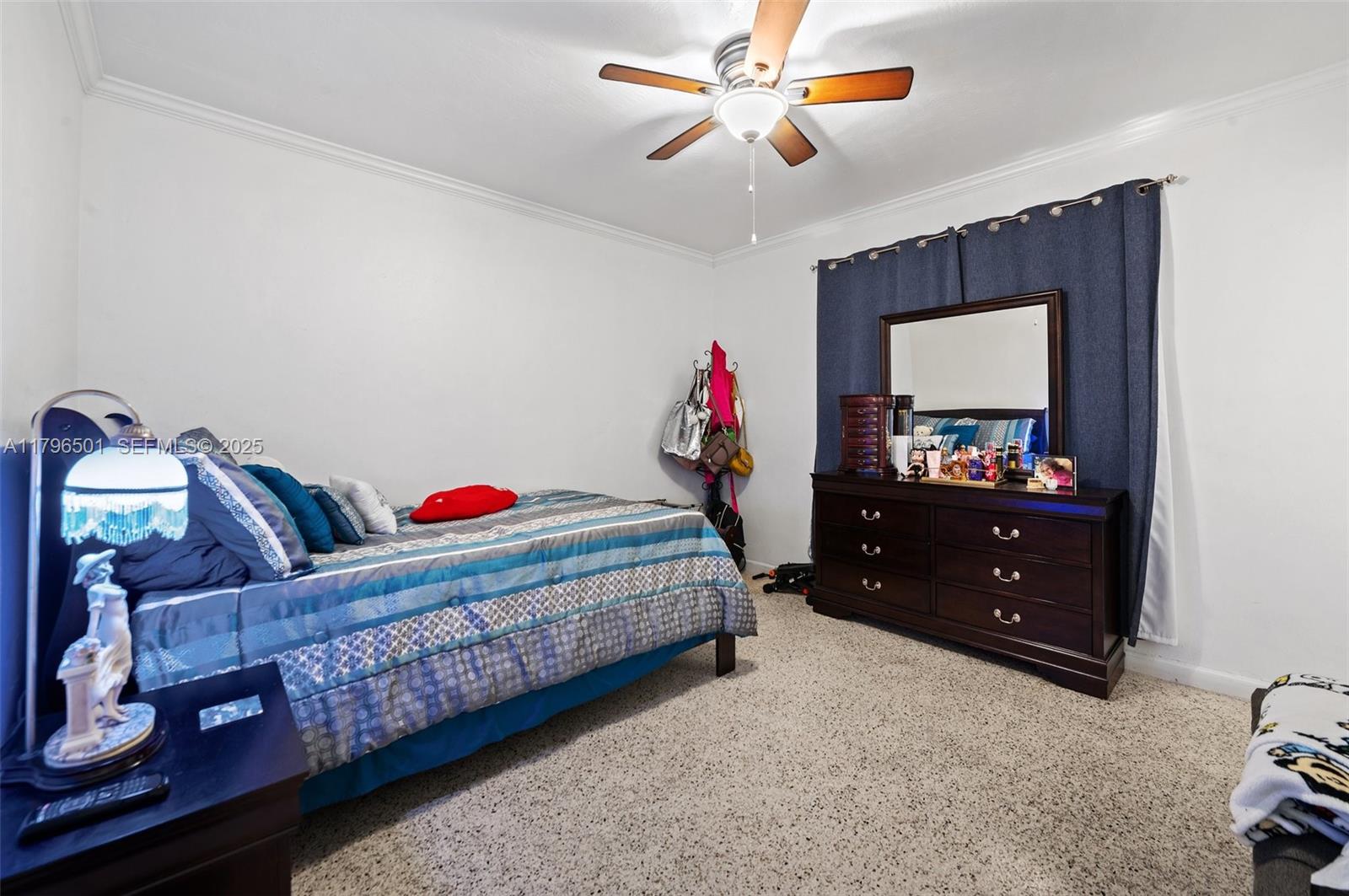 Hialeah Acres Hialeah, FL 33010 - Photo 23 of 55 a living room with furniture and a flat screen tv