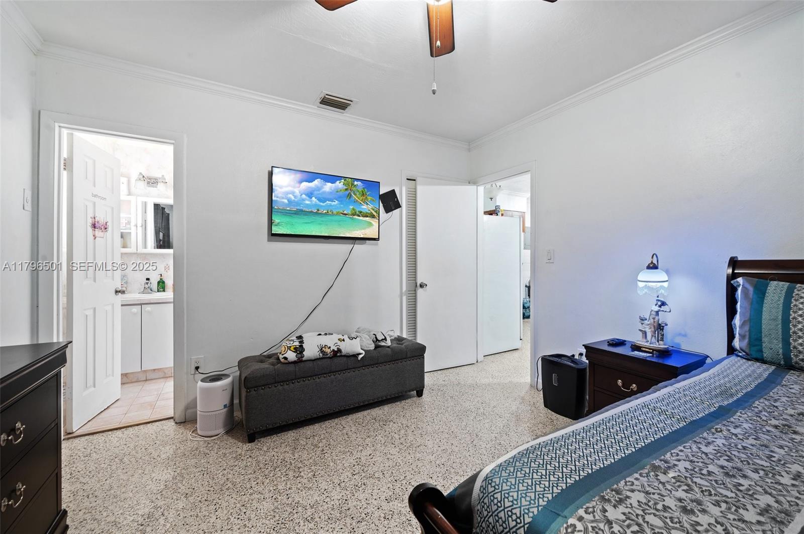 Hialeah Acres Hialeah, FL 33010 - Photo 24 of 55 a living room with furniture and a flat screen tv