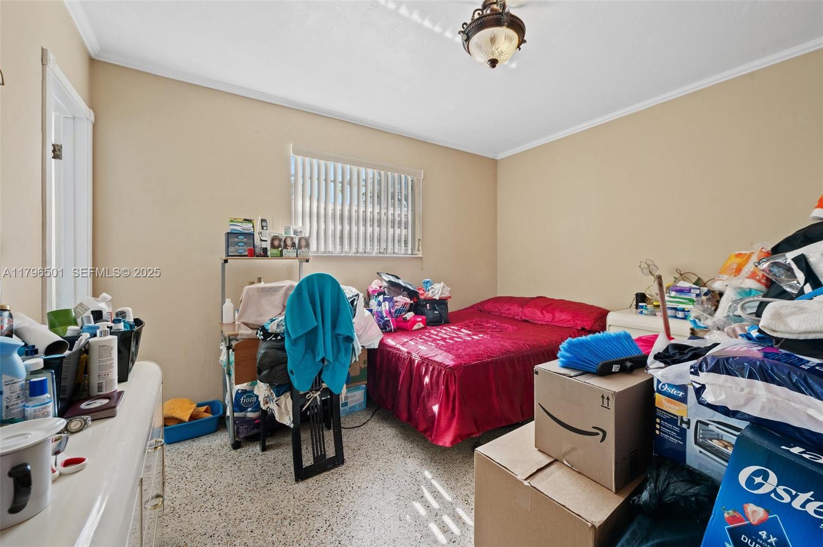 Hialeah Acres Hialeah, FL 33010 - Photo 33 of 55 a living room with furniture a rug and gym equipment